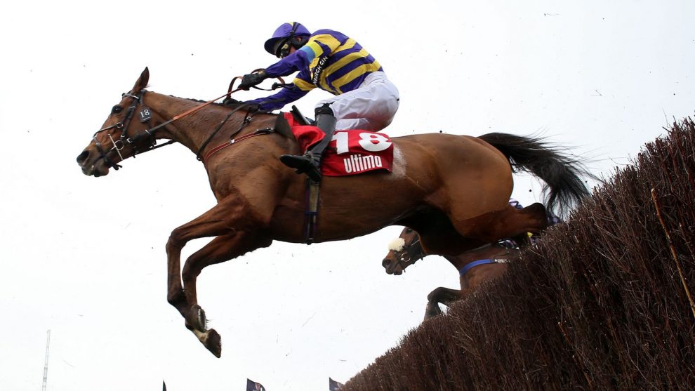 Corach Rambler ridden by Derek Fox on their way to winning the Ultima Handicap Chase