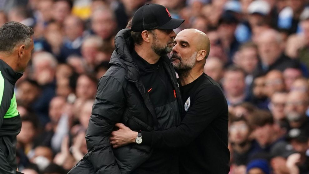 Pep Guardiola embraces Jurgen Klopp on the touchline