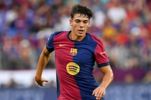 BALTIMORE, MD - AUGUST 06: Barcelona defender Alex Valle (12) dribbles up field during the Barcelona versus AC Milan 2024 Soccer Champions Tour match on August 6, 2024 at M&T Bank Stadium in Baltimore, MD. (Photo by Randy Litzinger/Icon Sportswire) (Icon Sportswire via AP Images)