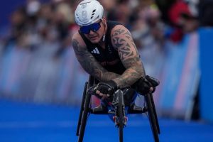 Britain's David Weir finishes the men's marathon T54 at the 2024 Paralympics, Sunday, Sept. 8, 2024, in Paris, France. (AP Photo/Thibault Camus)