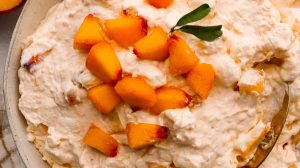 A bowl of peach fluff salad.