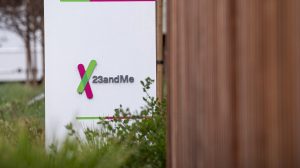 a sign outside 23andMe's office in California, featuring the company's office in the background