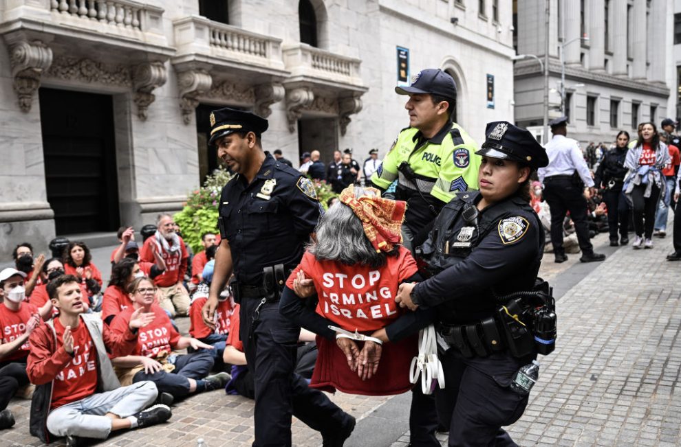 NEW YORK, UNITED STATES - OCTOBER 14: Officers from New York Police Department detain some protesters and intervene in the Pro-Palestinian demonstration outside New York Stock Exchange building in New York, United States on October 14, 2024. (Photo by Fatih Aktas/Anadolu via Getty Images)