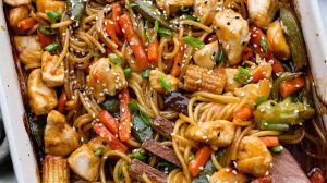 Overhead shot of honey sesame chicken noodle bake.